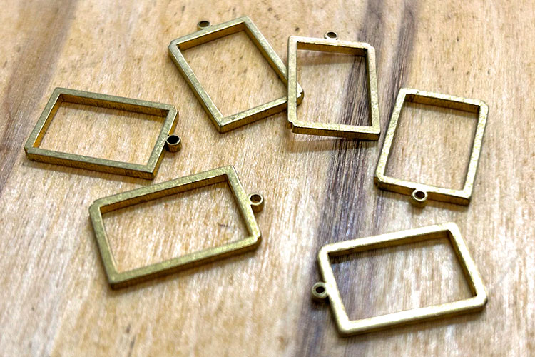 laser cutting Metal frames for resin-based accessories.